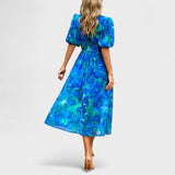 Clara – Elegáns virágmintás midi ruha